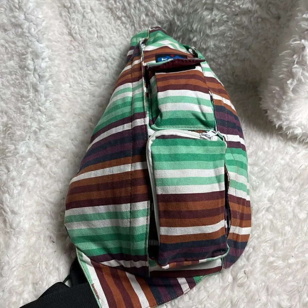 Kavu Rope sling back/ crossbody bag Canvas stripes Aztec color padded back .